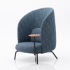 Dark blue modern accent chair with integrated orange side table & slim black legs - Stylish single seating for living room & contemporary spaces