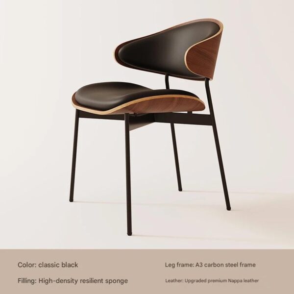 Modern wooden dining chair with curved backrest and leather seat in minimalist interior