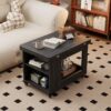 Black industrial coffee table with storage drawer and metal frame in living room