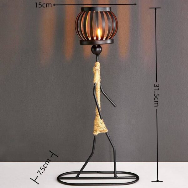 Handcrafted iron art figure lamp with woven rope design and lantern-style light, decorative table lamp for home décor.
