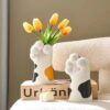 Tabletop Decor Scene With Yellow Flower Bouquet, Letter Blocks & White Stylized Ornaments (Yellow & Black Accents)