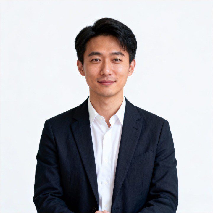 Professional headshot of Kenji Tanaka, a lead product designer at Orimart Design, specializing in modern and minimalist furniture.