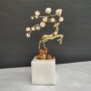 Light Luxury Brass Plum Blossom Deer Sculpture with Marble Base A light luxury decorative ornament featuring a polished brass deer sculpture in a leaping pose, paired with an enamel plum blossom branch, mounted on a solid white marble base. The design blends traditional Chinese auspicious symbolism with modern craftsmanship, ideal for entryways, living rooms, or office decor.