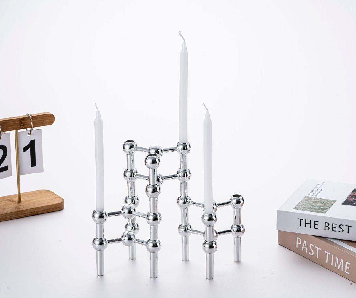 Polished chrome units stacked into a multi-level candelabra