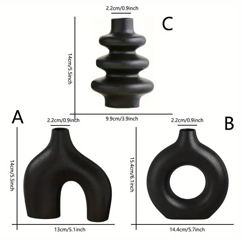Matte black colorway of the geometric ceramic vase set with arch, donut and ribbed shapes