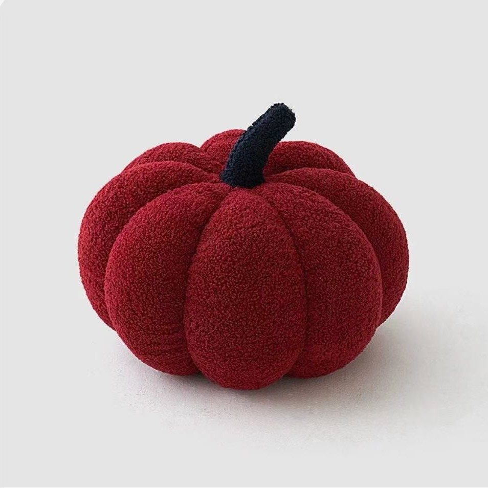 Deep red pumpkin cushion with contrast charcoal stem