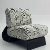 Black and white swirl print accent lounge chair with oversized plush cushions and sculptural bentwood base, front view